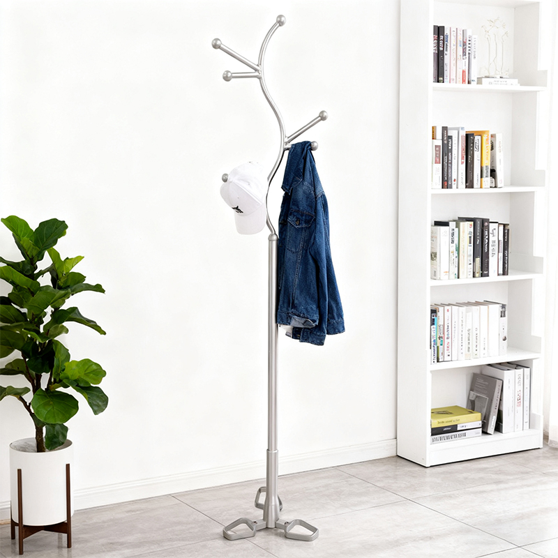 How can the bottom support structure of a metal coat rack be optimized to ensure stable placement on different surfaces?